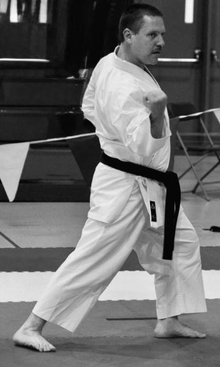 Doug performing a Bassai kata stance during Shotokan training